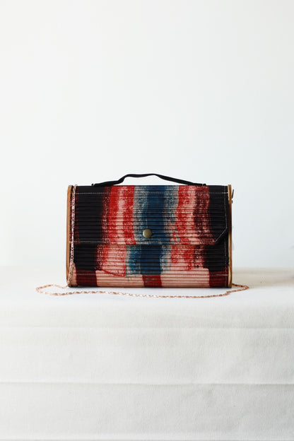 Kinu upcycled Capsule Clutch