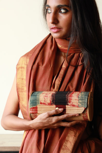 Meshi upcycled Capsule Clutch