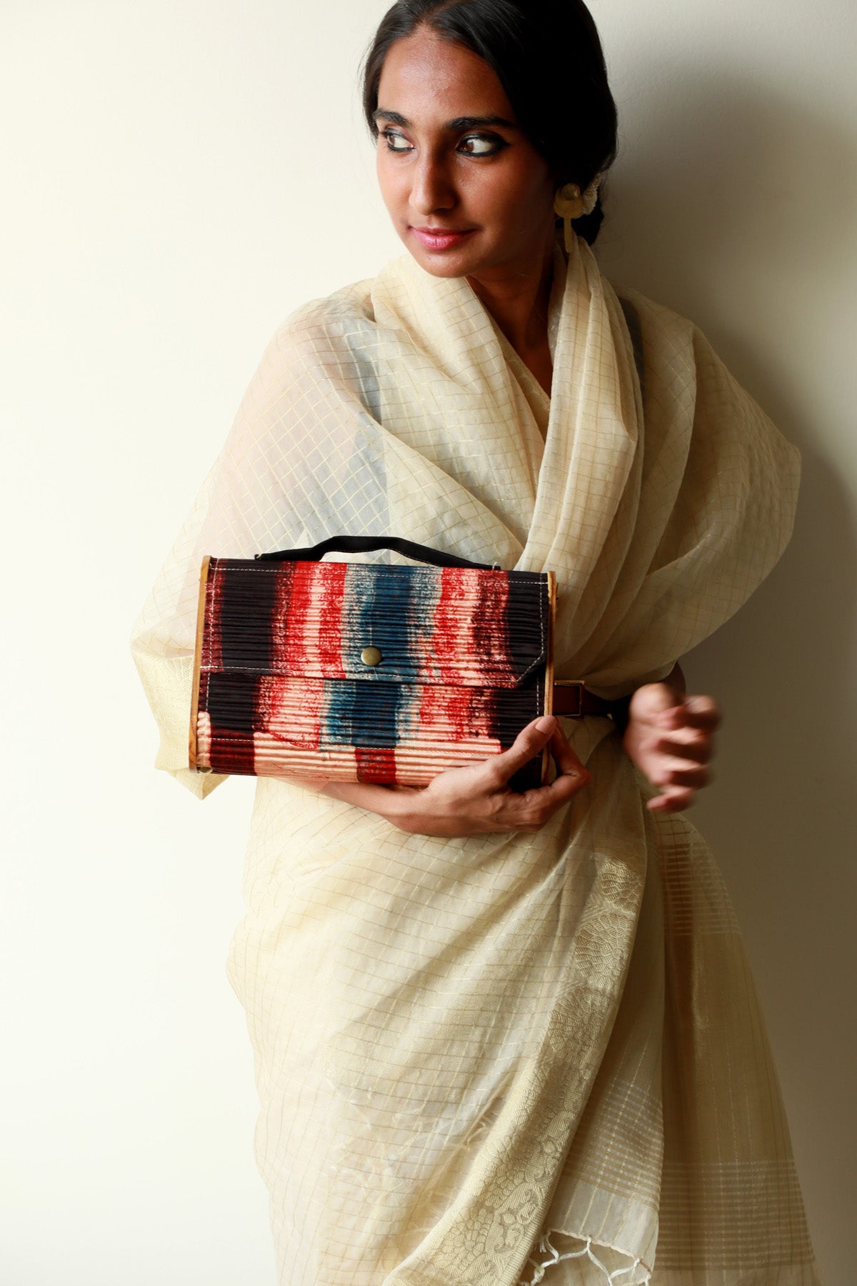 Kinu upcycled Capsule Clutch